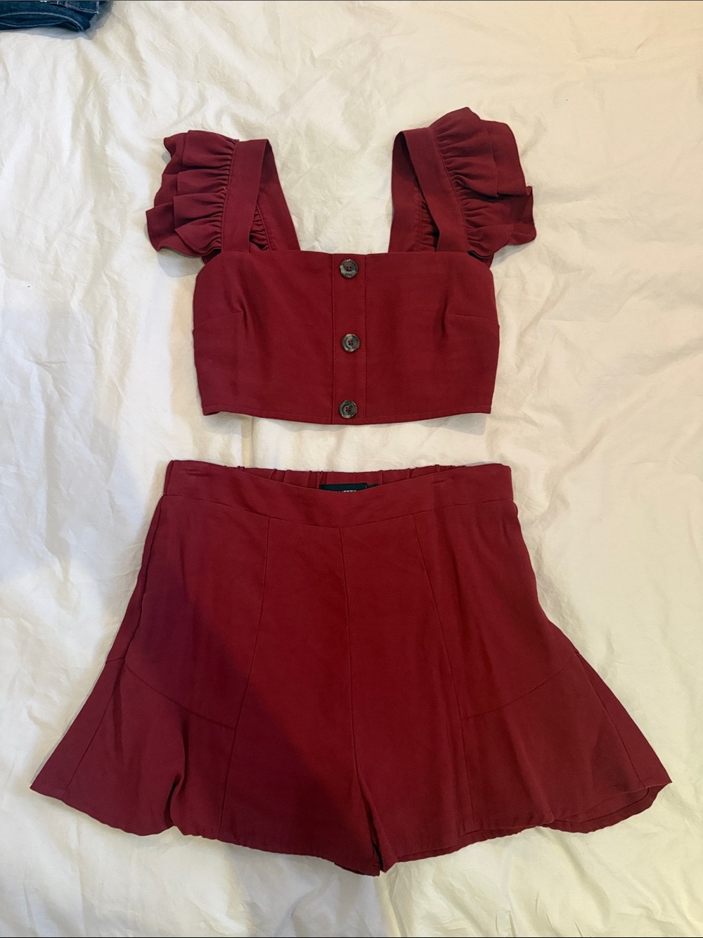 Etiquette Clothiers Burgundy Two-Piece Ruffle Strap Shorts Set